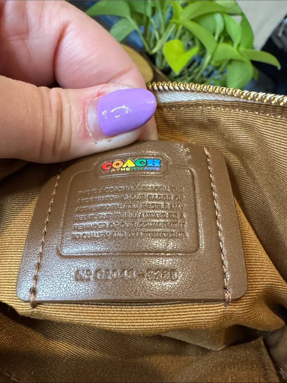 Coach White Pebbled Leather Wristlet with Rainbow Coach Logo